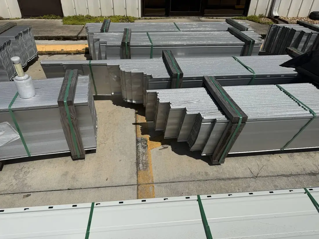 Standing seam panels cut to length and stacked for delivery in Tampa